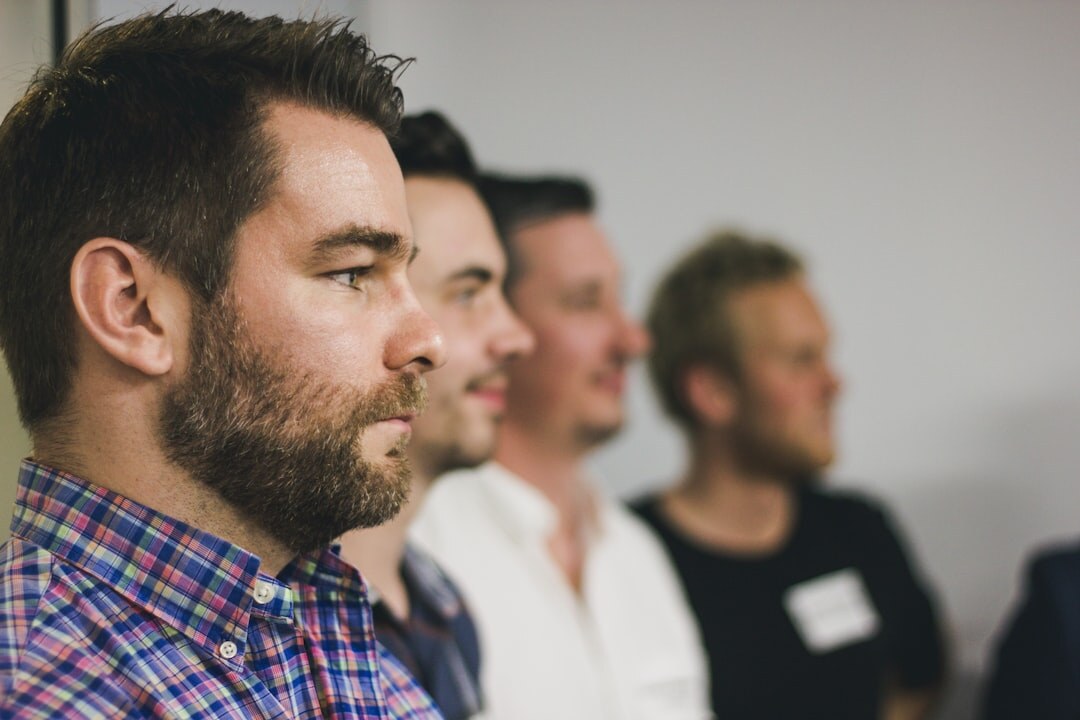 Group of adults rehearsing a panel discussion